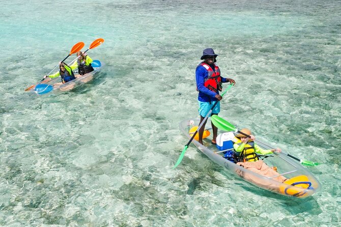 Clear kayaks on the shallow flats off Providenciales