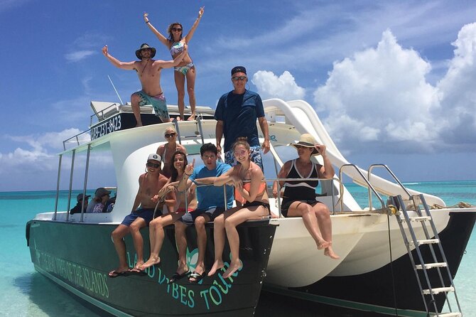 4hour Group Half Day Snorkeling Excursion in Grace Bay - Cruising back past Pine Cay and Fort George Island, then the dolphin hunt