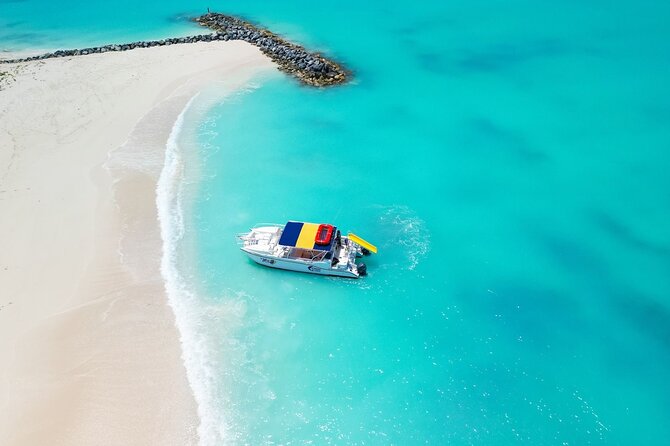 4HR Private Half-day Boat in Gracebay - Iguana Island, shipwreck moments, and photo-friendly stops