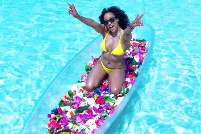 Clear Kayak Flower Girl Photoshoot in Turks and Caicos Islands - Floating on a Flower Bed, Posing, and Letting the Drone Pilot Capture the Overhead Shot