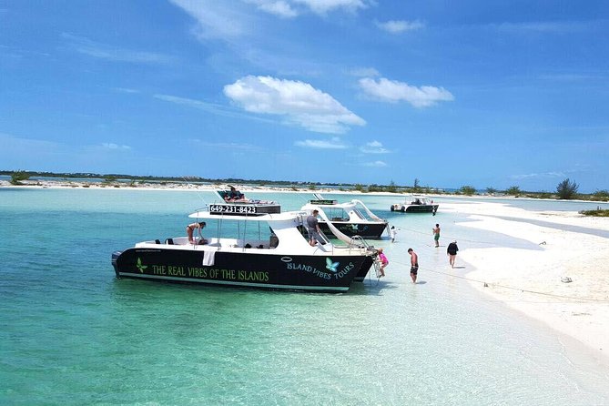 Full Day Beach BBQ Lunch & Snorkeling Excursion in Grace Bay - Water slide and jump platform at the end: the fun finish