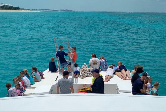 Group Reef, Beach and Sandbar Tour from Providenciales - Stop 1 on Grace Bay Beach, snorkel time plus beach break