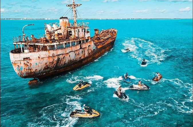 Jet Skiing around La famille ship and smaller pristine cays - Sandbar time and the ocean bar detour