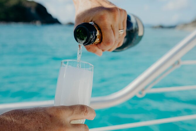 Lady Grace Signature Catamaran Sunset Sail from Ritz-Carlton - No-shoes boarding, how to stay comfortable when feet get wet