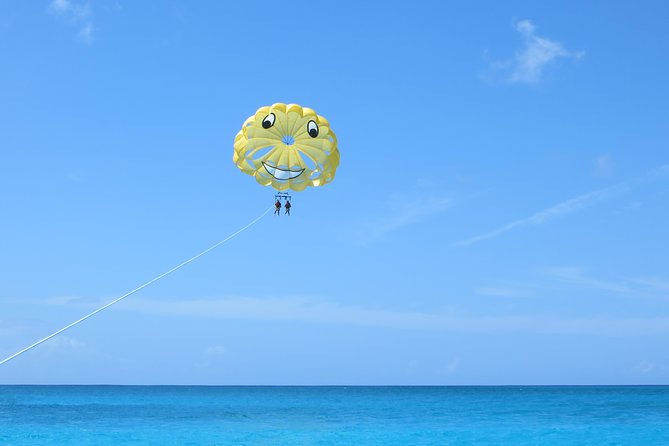 Parasailing Grand Turk - Harness up on the boat: bumpy ride, real safety care, and what happens right before lift-off
