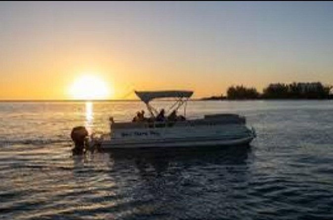 Private 2Hour Champagne Scenic Sunset cruise - Stop 1: Leeward Highway Canal Views and Million Home Scenery