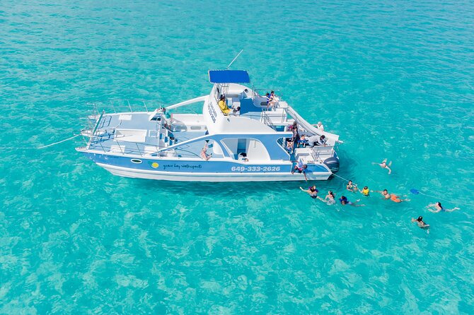 Private 4-Hour Catamaran Tour from Providenciales in Turks and Caicos - Grace Bay Beach cruise: iconic water views plus a shipwreck option