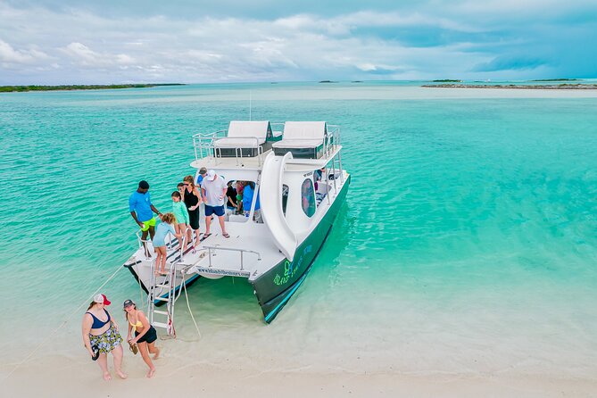 Private 4 Hour Power Catamaran Excursion in Grace Bay - Half Moon Bay, also called Iguana Island: lunch, swimming, and sand time