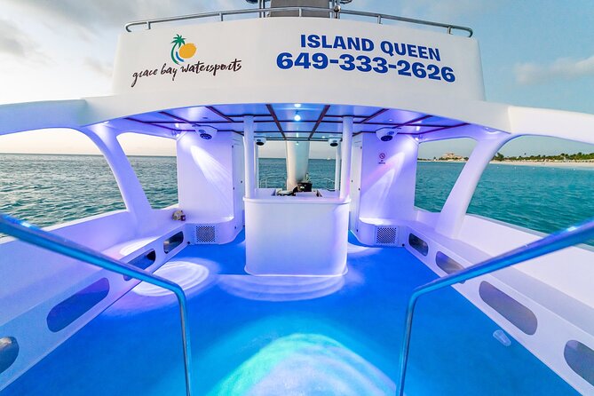 Private Catamaran Sunset Cruise in Turks and Caicos - What you actually do on the water: reefs, sunset, and the Soviet shipwreck