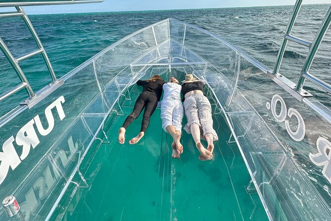 Private Clear Boat experience in Grace Bay - Photos from the bow vs. photos from your seat