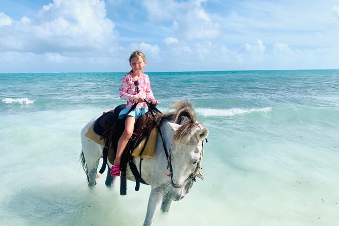 Shared Horseback Riding in Turks and Caicos - Why This Kids Horse Ride Works on Turks and Caicos Beaches