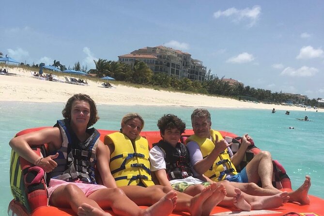Tubing on grace bay beach Turks and caicos islands - Photos, videos, and bottled water: small inclusions with big payoff